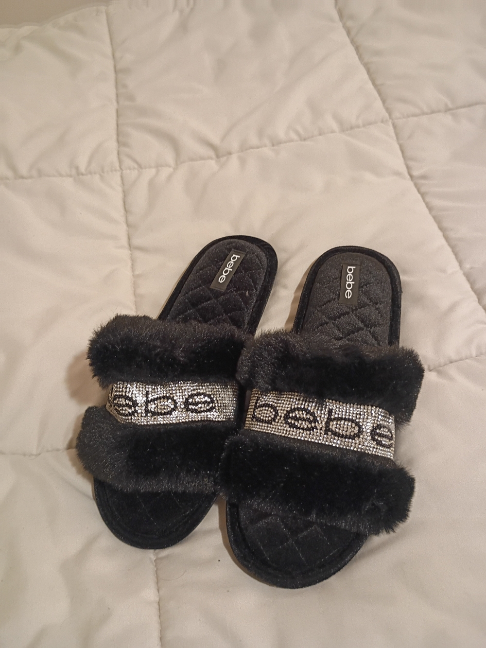 bebe Faux Fur Rhinestone Logo Slide Sandals in Black